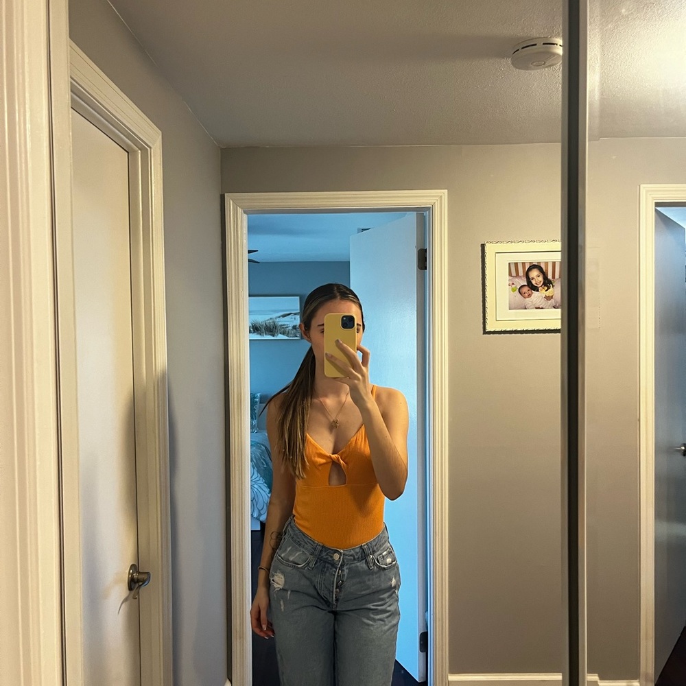 Orange Cut-Out Bodysuits